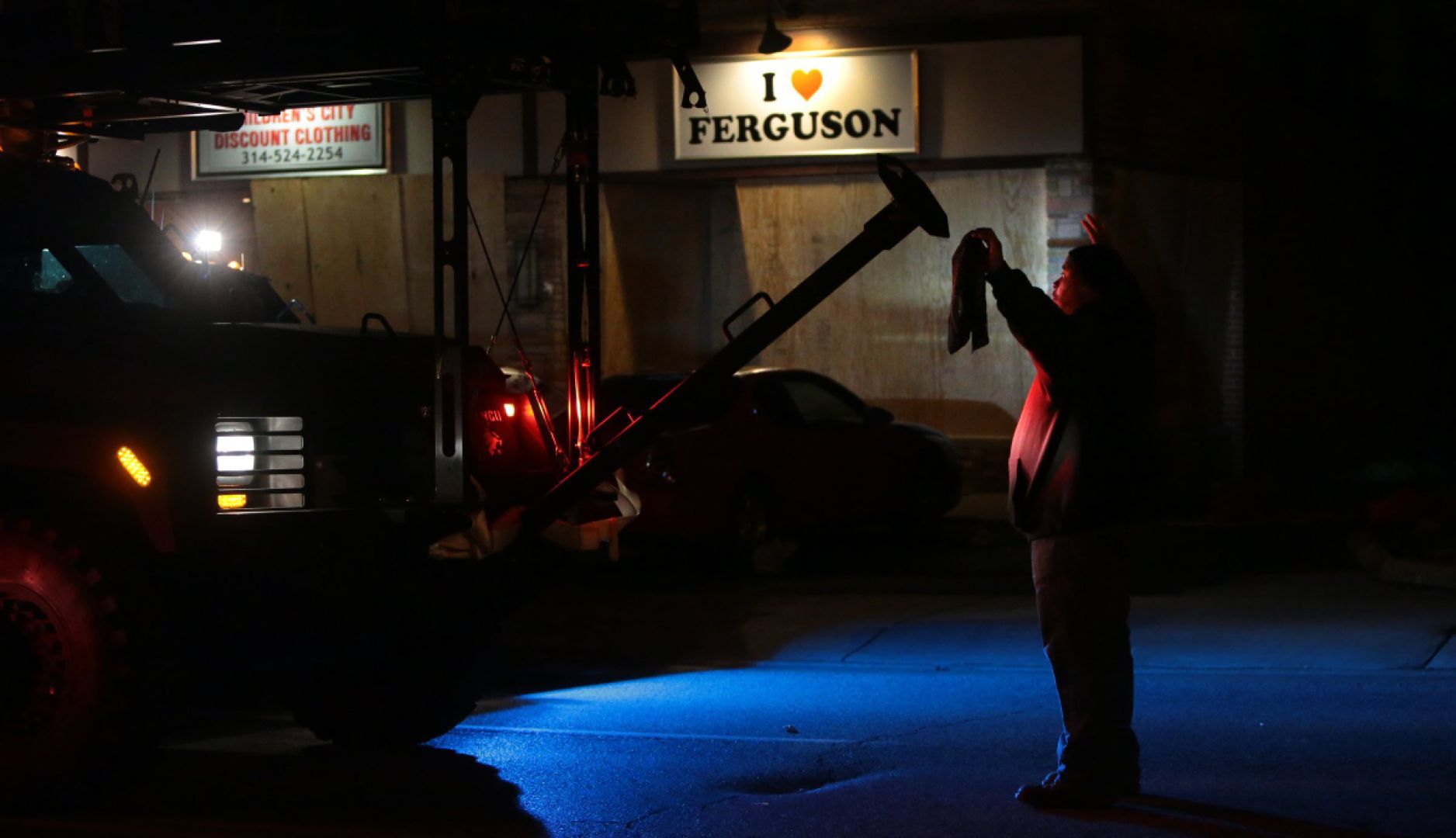 Protesters burn county police car in Ferguson after grand jury decision